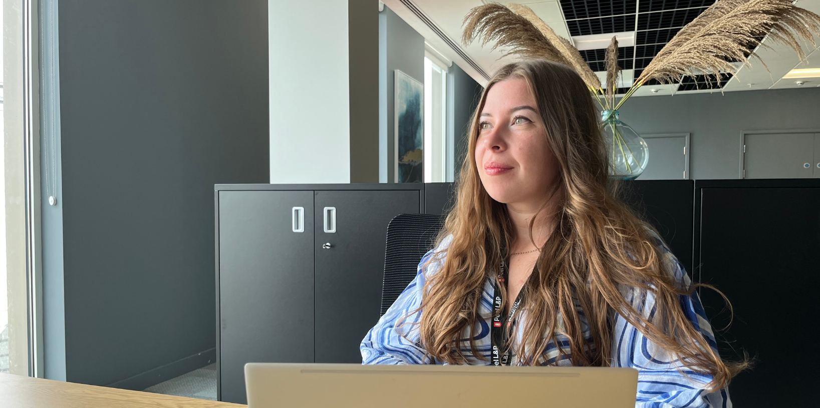 girl with laptop in workspace